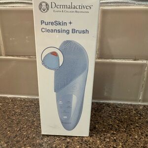 Dermalactives PureSkin Cleansing Brush - Light Blue —- Never used. Sealed